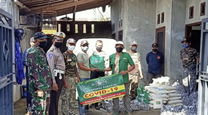 Suasana Harlah, Gugus Tugas Ansor Berbagi Sembako Barokah